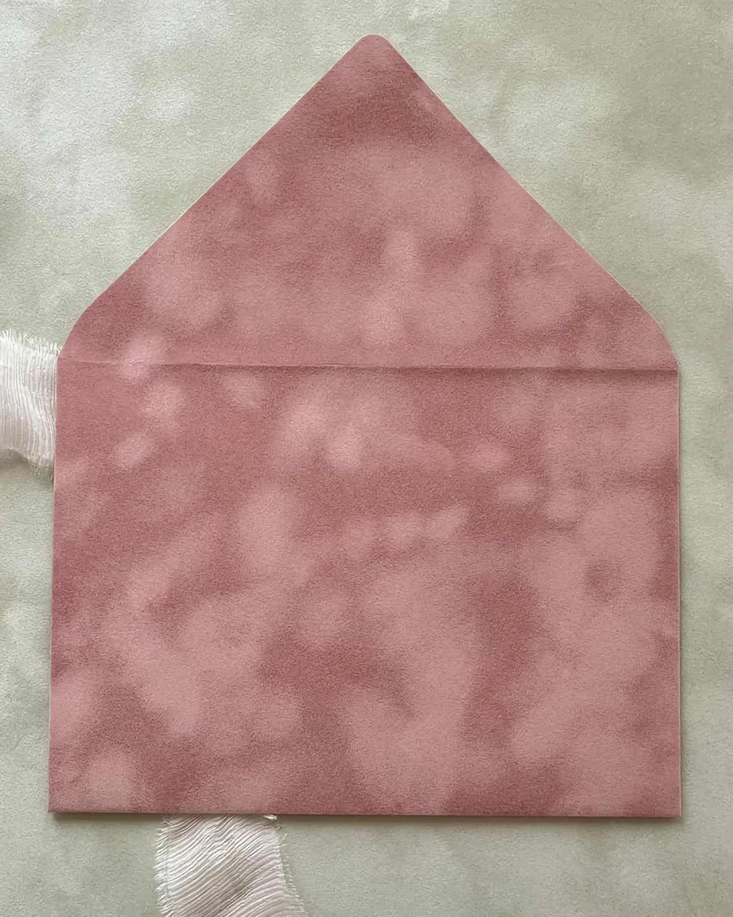 Dusty Pink velvet envelope flat lay close-up — Polina Perri
