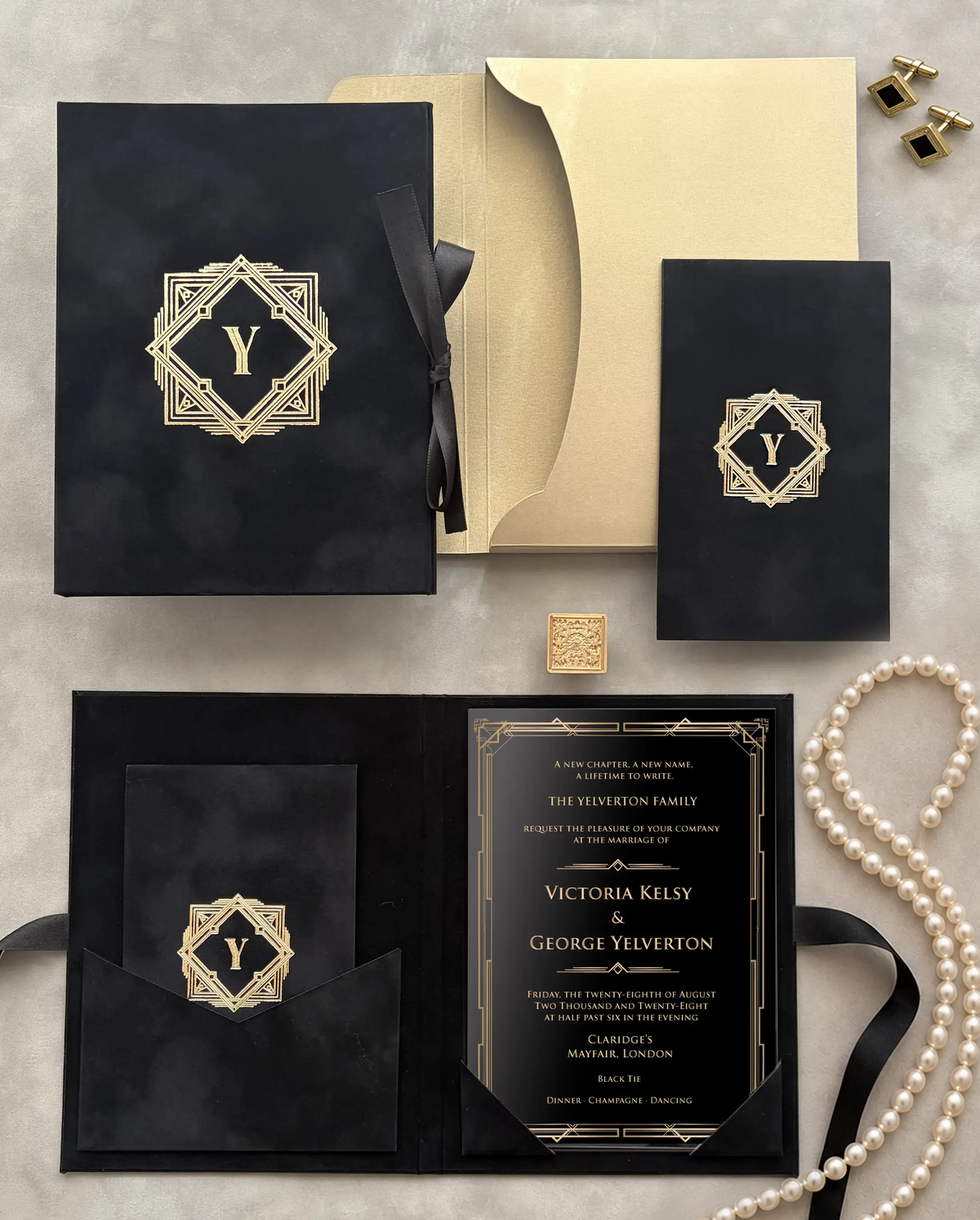 Great Gatsby Folio Invitation suite with black velvet folder, gold foil Art Deco monogram, black and gold invitation card and gold envelope — Polina Perri