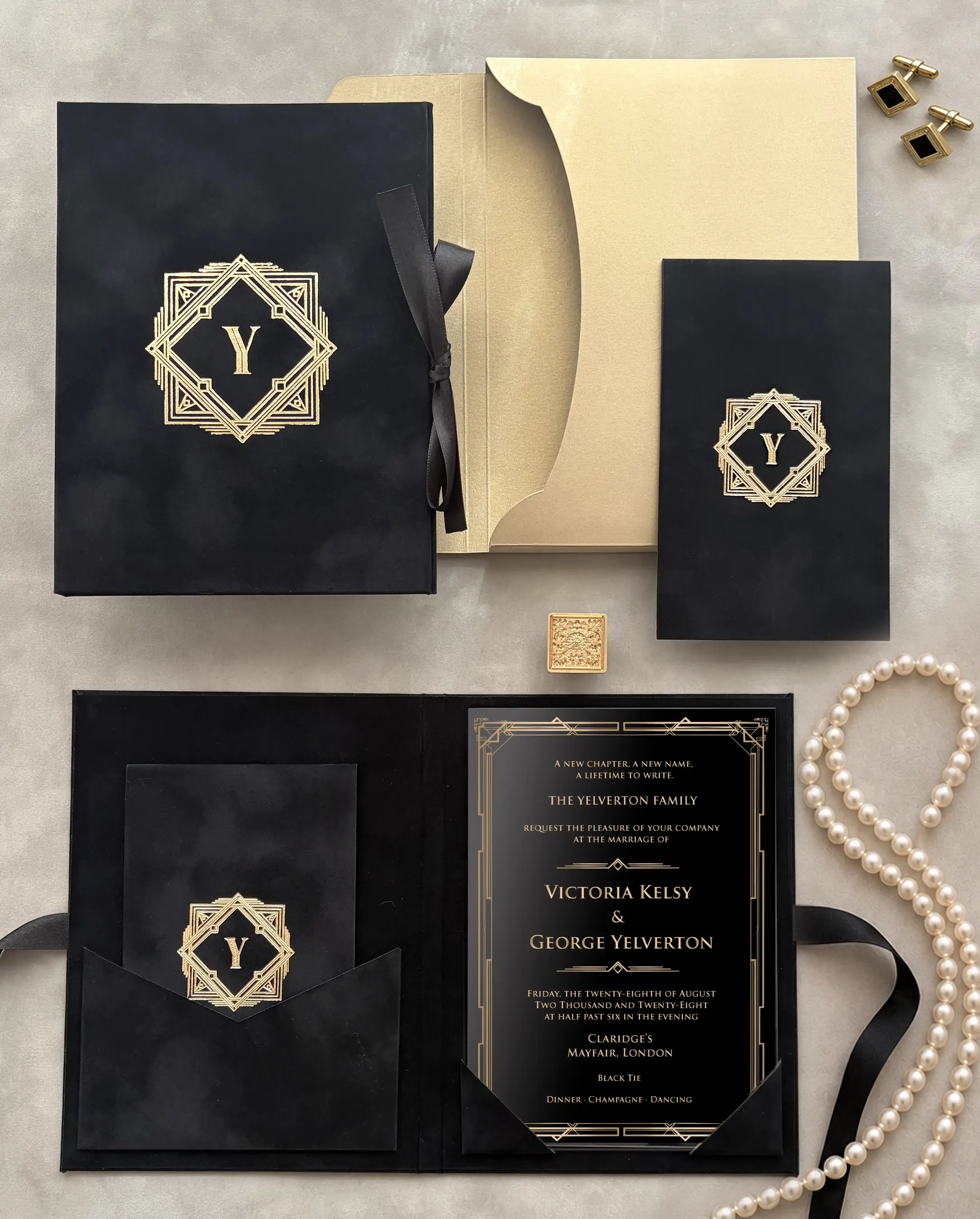 Great Gatsby Folio Invitation suite with black velvet folder, gold foil Art Deco monogram, black and gold invitation card and gold envelope — Polina Perri