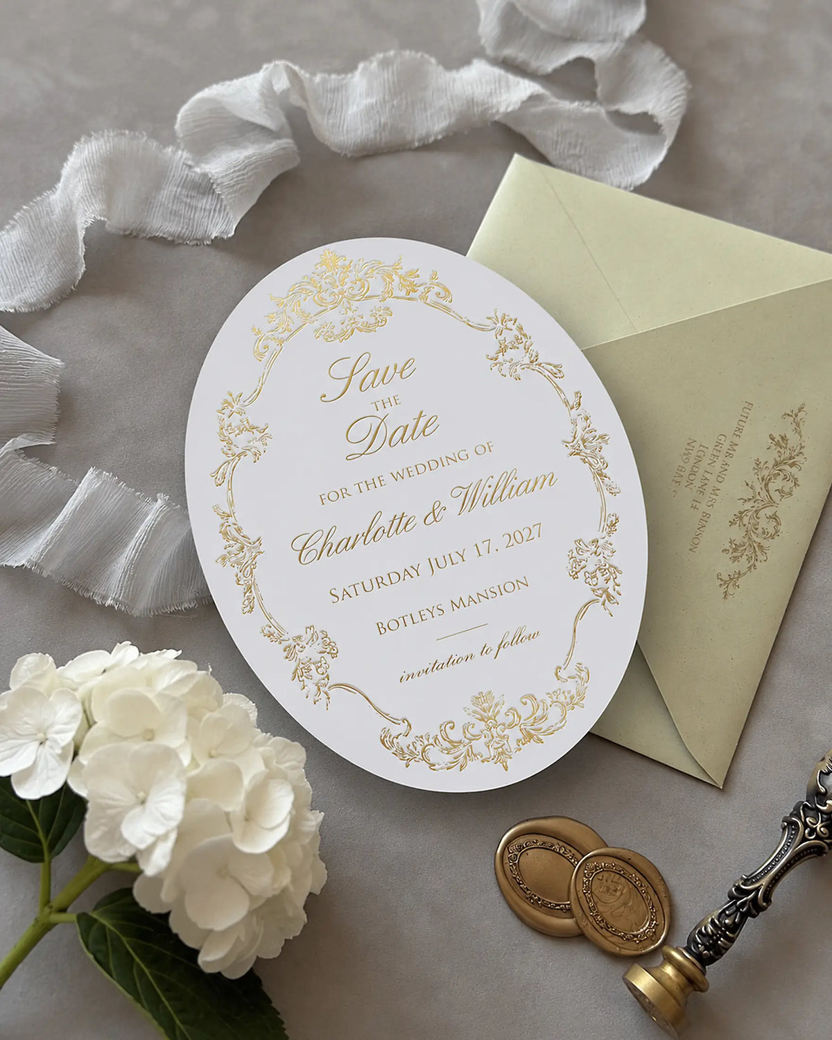 Oval save the date cards foil pressed with envelopes