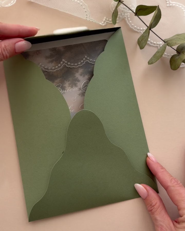 Video of the Florence olive green four-petal folder opening to reveal the vellum lace wedding invitation